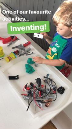 a young boy is playing with toys at a table that says, one of our favorite activities inventoring