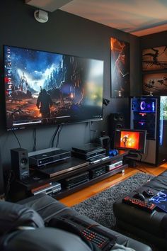 a living room filled with furniture and a large flat screen tv mounted to the wall