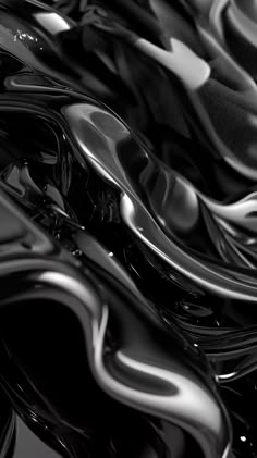 an abstract black and white photo with wavy lines