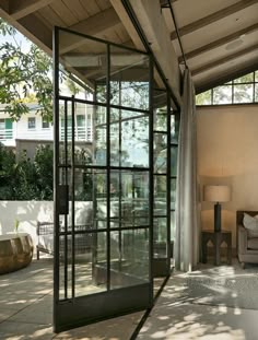 the inside of a house with glass walls