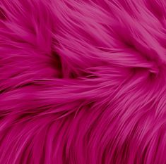 a close up view of pink fur