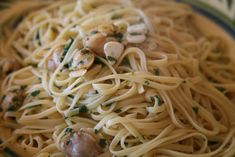 pasta with mushrooms and spinach on a plate