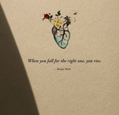 a drawing of a heart with flowers on it and a quote written in the middle