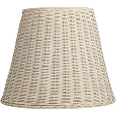 a white wicker lamp shade on a white background