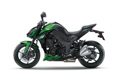 a green and black motorcycle on a white background