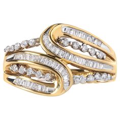 This stunning 10K yellow gold ring is the epitome of elegance and sophistication. With a unique open space bypass design, this ring is sure to turn heads. The round and baguette cut diamonds add a touch of glamour and sparkle, totaling 0.5 cttw and consisting of an impressive 74 diamonds. The H-I color and SI2-I1 clarity of the diamonds make them shine even brighter, while the prong setting ensures they stay securely in place. This ring is perfect for any woman who loves to make a statement with Bypass Ring, Baguette Cut Diamond, Diamond Settings, Baguette Cut, Yellow Gold Ring, Baguette Diamond, 2 Carat, Open Space, Yellow Gold Rings