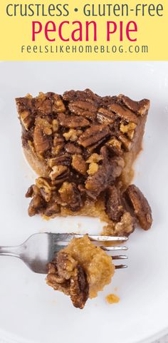 a piece of pecan pie on a white plate with a fork next to it