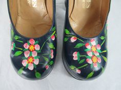 "Original Vintage 1960s blue leather platform shoes, heels. Has hand painted flowers, hippy flower power. They have 1 1/2\" platforms and 4 5/8\" heels! All leather lined and leather soles. Inside reads: Creca Shoes hand made in Greece. Marked size 6 0 on the bottom, check inside contour measurement for fit. The soles measure 3\" wide. Inner contour is 9 7/8\" long. Platform is 1 1/2\", heel is 4 5/8\". Shoes are in very good condition, very wearable. Small scratch on front of left toe(photo)." 1960s Shoes, Hippie Shoes, Heels Vintage, Military Bag, Platform Shoes Heels, Hippie Flowers, Army Shirts, Hand Painted Shoes, Vintage Heels