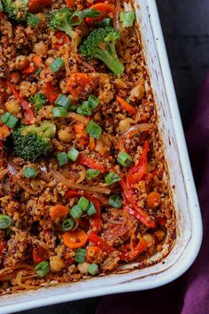 a casserole dish filled with meat and vegetables