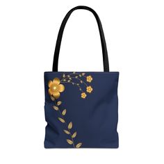 Elevate your style with this stylish Gold Flowers on Navy Blue Tote Bag, perfect for making a fashion statement. This fashionable and convenient accessory is crafted from 100% polyester for durability and comfort. Suitable for those who want to showcase their individuality and carry their essentials with ease. Relevant for everyday use, shopping, beach trips, and as a gift for fashion-forward individuals. Product features - 100% Polyester body: Strong and durable synthetic fabric - Seamless thread color: Black inner stitching and transparent thread on hems - Reinforced stitching on handles for extra strength - Boxed corners for added room - Comes with non-woven laminate inside and black cotton handles Care instructions - Remove all items from the bag before cleaning. Suggested to pretreat Trendy Navy Rectangular Shoulder Bag, Trendy Blue Gift Shoulder Bag, Trendy Blue Shoulder Bag For Gift, Blue Shoulder Bag For Gift, Chic Blue Shoulder Bag Gift, Chic Blue Bag For Gift, Chic Blue Shoulder Bag For Gift, Elegant Blue Gift Bag, Blue Rectangular Bags For Gifts