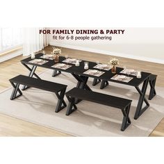 a black dining table with benches and place settings for people to sit at the end