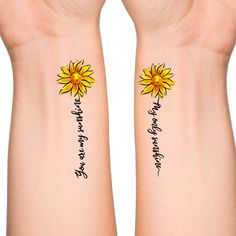 two sunflowers with words written on their arms