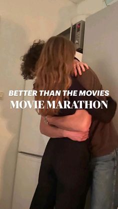 two people hugging each other in front of a refrigerator with the words, better than the movies movie marathon