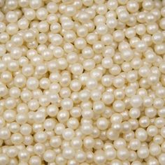 white pearls are shown in this close up photo