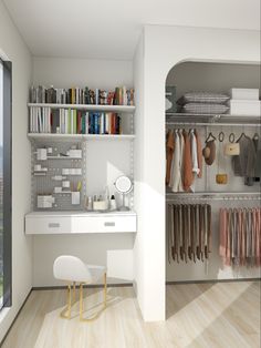 a white desk and chair in front of a closet full of clothes, books, and other items