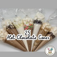 five cones filled with white chocolate and marshmallows