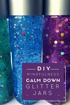 three glitter tumbles with the words diy mindfuness calm down