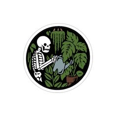 a skeleton holding a watering can in front of some plants