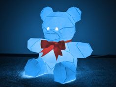 Create an adorable paper lamp in the shape of a teddy bear with simple materials and our PDF pattern! Kids will love this light-up figure beside their bed. Kind of like a foot tall night light you can customize! Makes a great baby shower gift when complete. This cuddly little guy sits on your table or shelf and gives light to a little reading corner or wherever you need. It's a great piece for adding character to a child's room.  Lamp looks beautiful in white, though you may try using thin, colo Bear Lamp, Paper Lamps, Afternoon Crafts, Build Yourself, Rabbit Figurine, Easter Projects, Easy Paintings, Color Card, Craft Kits