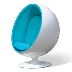 a white and blue ball chair sitting on top of a table