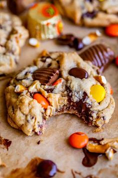 chocolate chip cookies with candy and m & ms in the middle