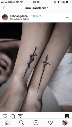 two people with matching tattoos on their arms