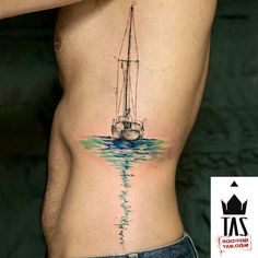 a man with a boat tattoo on his stomach