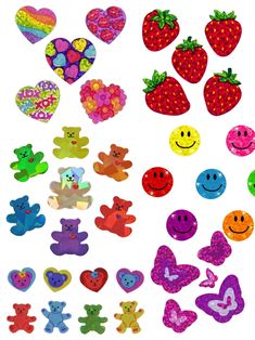 a bunch of different shapes and sizes of magnets on a white background with hearts