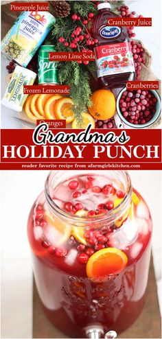 Red holiday punch in clear glass drink dispenser with orange slices, fresh cranberries and ice cubes.