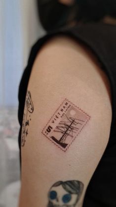 a person with a tattoo on their arm