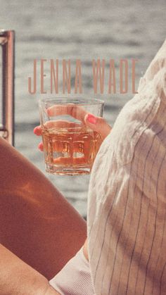 a woman holding a glass of water with the words jenny wade in front of her