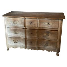 an old wooden dresser with many drawers