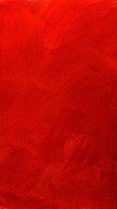 an abstract painting with red paint on it's edges and some white dots in the middle