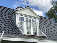 an image of a roof with windows on it