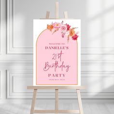 an easel with a sign that says welcome to danielle's 21st birthday party