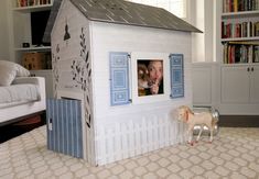 there is a doll house with a horse in it