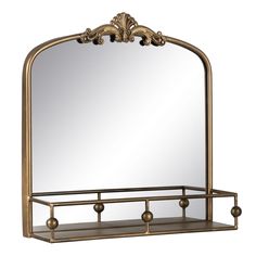 an ornate gold metal shelf with a mirror on the top and two shelves below it