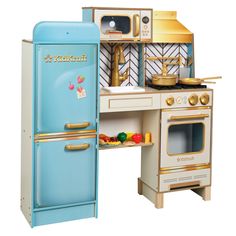 a toy kitchen with an oven, stove and refrigerator