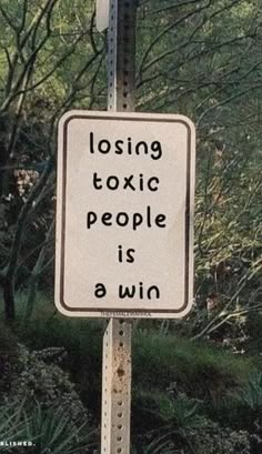 a sign that says losing tonic people is a win