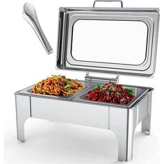 a stainless steel lunch box with two compartments filled with food and a serving utensil