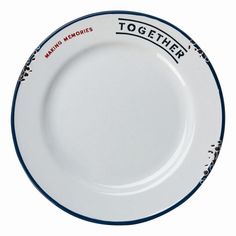 a white and blue plate with the words together on it's rim, against a white background