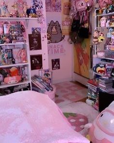 a room filled with lots of toys and stuff on the floor next to a bed