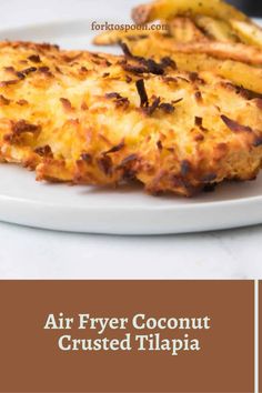 air fryer coconut crusted tilapia on a white plate with text overlay