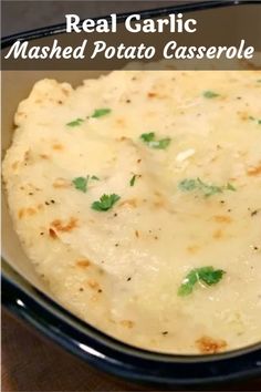 mashed potato casserole in a blue dish with parsley garnish