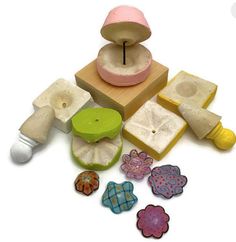 an assortment of wooden toys on a white background with clippings to cut them