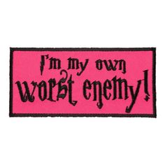 a pink patch that says i'm my own worst enemy with black writing on it