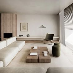 a modern living room with white walls and furniture