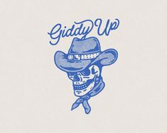 a skull wearing a cowboy hat with the words giddy up on it's side