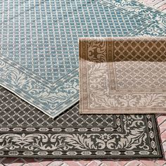 four different rugs are arranged on top of each other in various colors and patterns