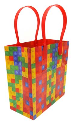 a bag made out of lego blocks with red handles and two handles on each side